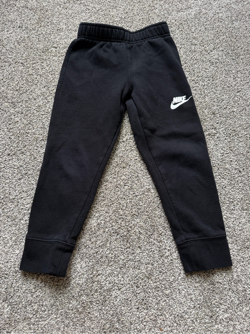 Nike Kids Black Joggers with White Swoosh